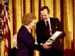 George Bush awarding Margaret Thatcher the Presidential Medal of Freedom, shortly after she ceased to be Prime Minister.