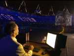 Berners-Lee in front of a Next Cube computer at the Olympic Opening Ceremony